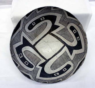 Prehistoric Reserve Black on White Geometric Bowl: Prehistoric Native American Reserve Black on White Bowl. Has been broken and glued. Crisp color. Bowl design is in negative. Measures 4.25''x9''. This item is from the Arthur P. Zeitling estate. Acqui