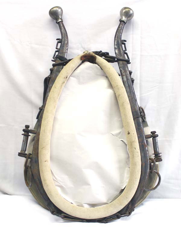 Vintage Horse Collar Mirror With Hames: Horse Collar Mirror With Vintage Hames. Horse collar measures approx. 22'' x 16''. Hames are older, silver tipped, complete with leather straps and rings and all hardware. Mirror is in excellent condi