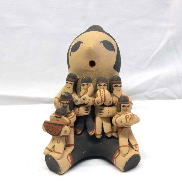 Jemez Storyteller Doll - C. Chavez: Native American Jemez Storyteller Doll - C. Chavez. Measures approx. 6 1/2''H x 5 1/4''W x 5''D. Buyers Pay Actual Shipping and Handling Charges(see terms and conditions for more information).