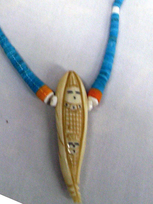 Navajo Corn Maiden Pendant Turquoise Necklace: Native American Navajo Corn Maiden Necklace w/Turquoise, red & white shell heishi beads. Measures 20'', carved corn maiden measures 3'' in length. Buyers Pay Actual Shipping and Handling Charges(see t