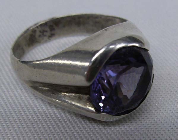 Alexandrite Stone Ring, 8.5 Carats Sterling Silver: Alexandrite Stone Ring, 8.5 Carats Sterling Silver Setting. Stone is likely synthetic or simulated, color changes from a light violet to pale blue. Size is 10, Mexican silver, marked 925. Purchased in