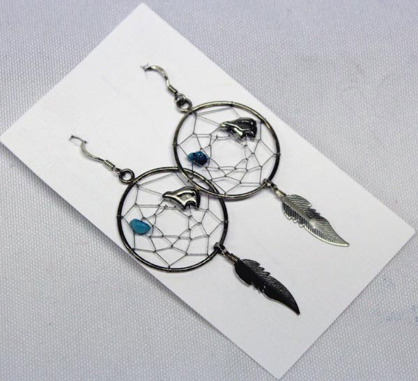 Western Sterling Dream Catcher Earrings: Dream Catcher Earrings. Bear and turquoise nugget in web, silver feathers hanging. Web is 1'' diameter. Buyers Pay Actual Shipping and Handling Charges(see terms and conditions for more information).