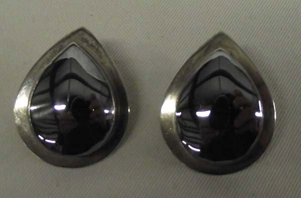 Navajo Sterling Hematite Pierced Earrings: Navajo Sterling Hematite Pierced Earrings. Measure approx. 1 1/8'' x 1''. Buyers Pay Actual Shipping and Handling Charges(see terms and conditions for more information).