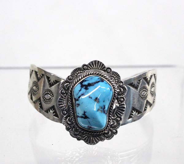 Navajo Sterling Silver Turquoise Bracelet by Jeff James: Native American Navajo Sterling Silver Turquoise Bracelet by artist - Jeff James Jr. Measures approx. 6.5" inside measurement, including openinhg, with a width of 1 1/8". Buyers Pay Actual Shipping an
