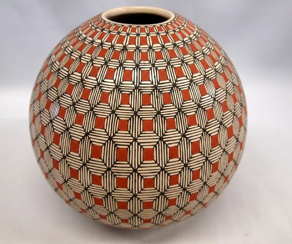 Mata Ortiz Eyedazzler Pottery Jar by Nely Lopez: Mata Ortiz Eyedazzler Pottery Jar by Nely Lopez. Measures 6''Hx6''W. Buyers Pay Actual Shipping and Handling Charges(see terms and conditions for more information).