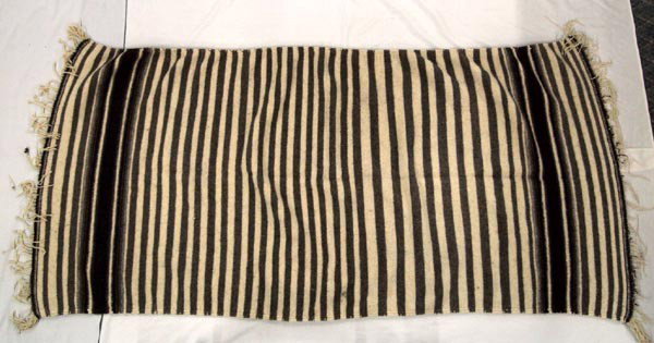 Mexican Wool Handmade Blanket: Mexican Wool Handmade Blanket. Measures 89''x40''. Some of the fringe yarn are shortened or missing. A few very small moth holes. Buyers Pay Actual Shipping and Handling Charges(see terms and conditio