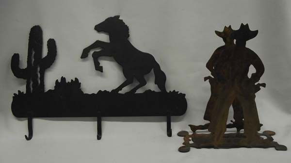 Wrought Iron Cowboy Book Holder & Belt Hanger: Wrought Iron Cowboy Book Holder & Belt/Coat Hanger. Book Holder measures approx. 8''H x 3 1/2''W. Belt/Coat hanger measures approx. 14''L x 9 1/2''H. Buyers Pay Actual Shipping and Handling Charges(se