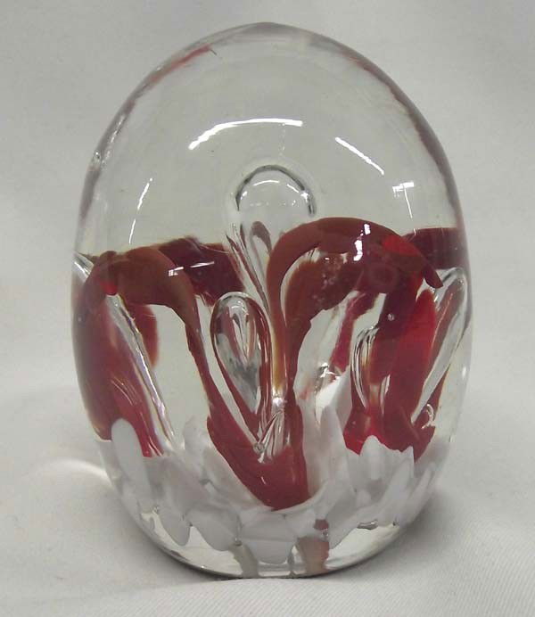 Red & White Cane Bubble Glass Paperweight: Red & White Cane Bubble Glass Paperweight. Measures approx. 3''H x 2 1/2''W. Donated by John Carlisle for the benefit of the High Desert Human Society, Silver City, New Mexico. Buyers Pay Actual Shipp