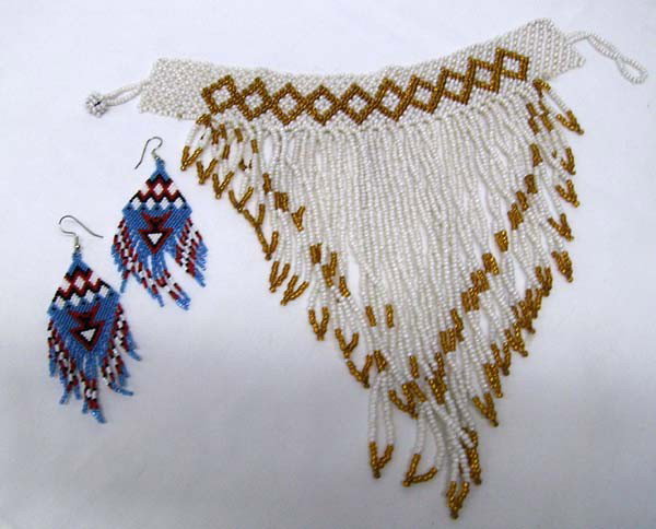 Beaded Neck Collar and Earrings: Beaded Neck Collar and Earrings. Choker style collar measures 12 1/2''. Aurora borealis and gold beads, width of collar measures 1 1/2'', longest strung beads w/collar measures 9'' total. Beaded earri