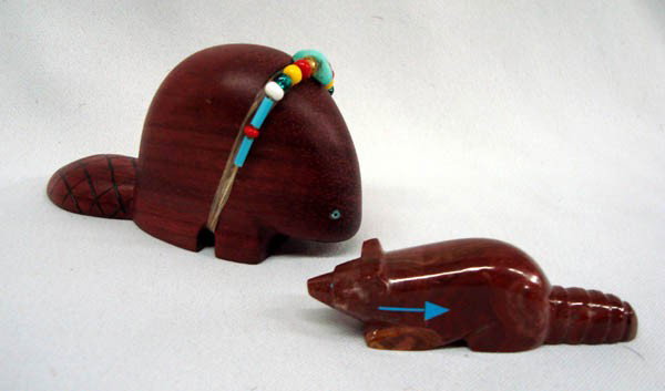 1 Wooden Beaver Fetish & 1 Stone Raccoon Fetish: 1 Wooden Beaver Fetish & 1 Stone Raccoon Fetish. Beaver 4''L x 2''H. Signed on bottom ''1995 D.L.P.'' Raccoon is 2.5''long, signed ''CAP'' and has sticker '' Abby Panteah 39-RL''. Both have turquoise 