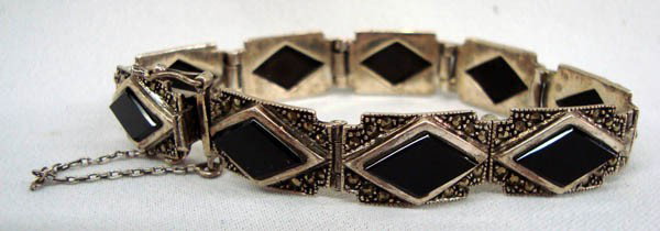 Marcasite Silver & Onyx Bracelet: Marcasite Silver and Onyx Bracelet. Has safety chain and latch. Measures approx 6.5'' wrist including opening. Buyers Pay Actual Shipping and Handling Charges(see terms and conditions for more informa