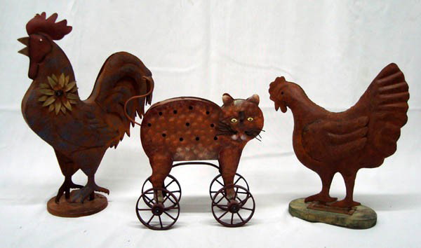 Mexican Tin Art Animals: Three Mexican Tin Art Animals with Rust Patina. Rooster is 14.5''H x 10''W. Hen is 9.5''H x 10'' W. Cat on wheels is 9''W x 10''H. Buyers Pay Actual Shipping and Handling Charges(see terms and conditi