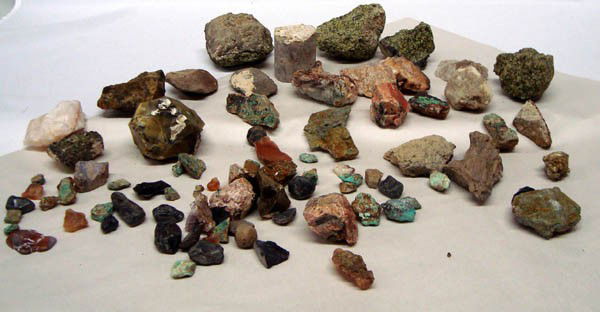 Collection of Rock Specimens: Collection of Rock Specimens including Apache Tears (Obsidian), fool's gold, peridot, flint, fire agates and more. Largest is approx. 3.5''L x 3.25''W x 3''H. Heavy. Buyers Pay Actual Shipping and Han
