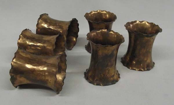 Copper Hand Tooled Napkin Rings: Copper Hand-tooled Napkin Rings, 6 pcs. Measures 1 3/4'' high x 1 1/2'' wide. Buyers Pay Actual Shipping and Handling Charges(see terms and conditions for more information).