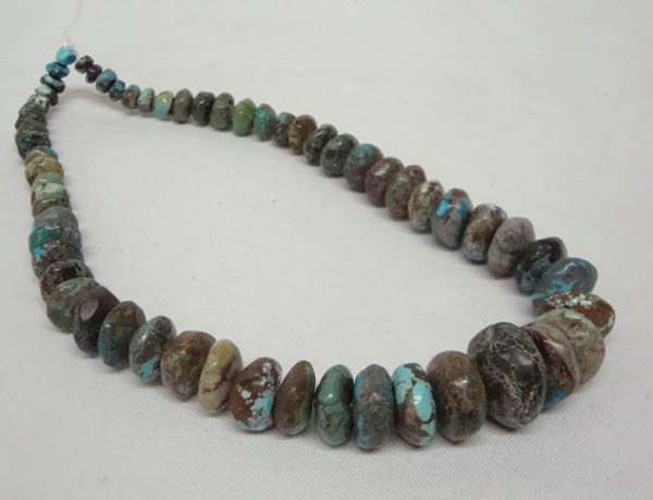 Strand of Graduated Turquoise Stones for Jewelry: Strand of Graduated Turquoise Stones for Jewelry. 14'' long. Largest stone is 5/8'' diameter. Multi colored stones with different types of matrix. Buyers Pay Actual Shipping and Handling Charges(see t