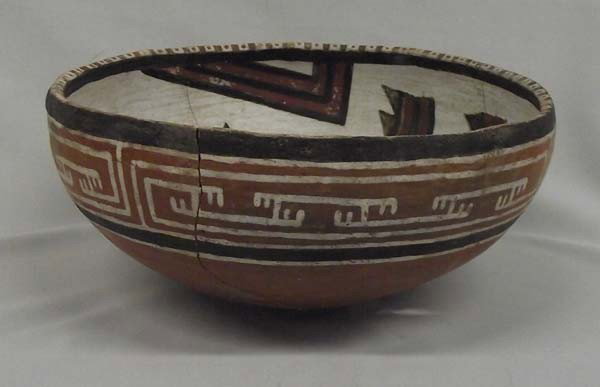 Rare Prehistoric Polychrome Showlow Bowl: Rare Prehistoric Polychrome Showlow Bowl, measures approx. 4''H x 9''H. Red, Greenish Black, Black on White. Red & White Dot Dash Rim. Black & White Flying F on Red. Has been glued, no overpaint, no p