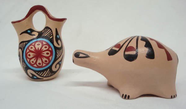 Jemez New Mexico Clay Painted Pottery: Set of Two -Native American Jemez, New Mexico Clay Painted Pottery. Signed by ''Chinna'' on the bottoms. Largest is 4'' diameter x 3''H. One is turtle shaped. Clean and vibrant. Buyers Pay Actual Ship