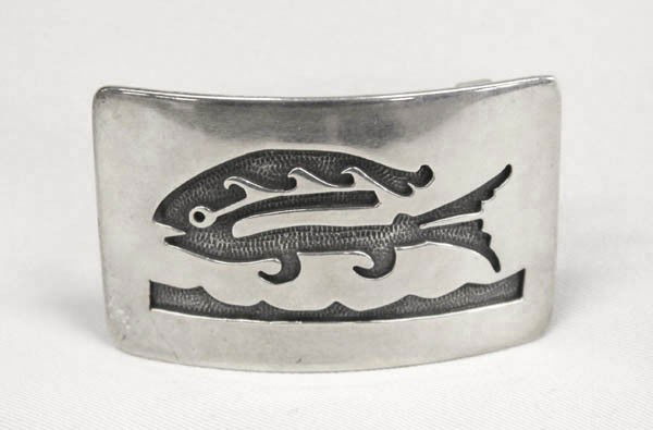 Hopi Sterling Overlay Fish Belt Buckle Hallmark: Hopi Sterling Silver Overlay Fish design Belt Buckle Hallmark inside with a crab and sunface. Measures approx. 1 1/2"H x 2 1/2"W. Buyers Pay Actual Shipping and Handling Charges(see terms and conditio