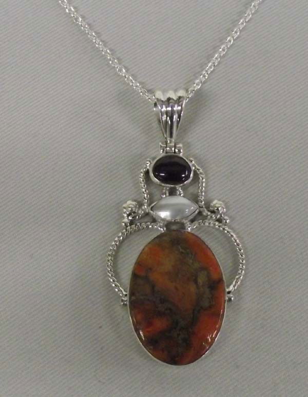 Orange Copper Agate Pendant Sterling Necklace: Orange Copper Sterling Silver Pendant on 24'' sterling chain. Approx 2''L with bail. Buyers Pay Actual Shipping and Handling Charges(see terms and conditions for more information)
