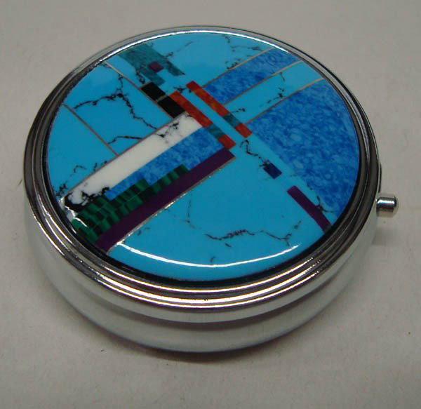 Turquoise and Misc Stone Inlay Pill Box: Turquoise and Misc Stone Inlay Pill Box. 1.7/8'' diameter. Push button opener. Buyers Pay Actual Shipping and Handling Charges(see terms and conditions for more information)