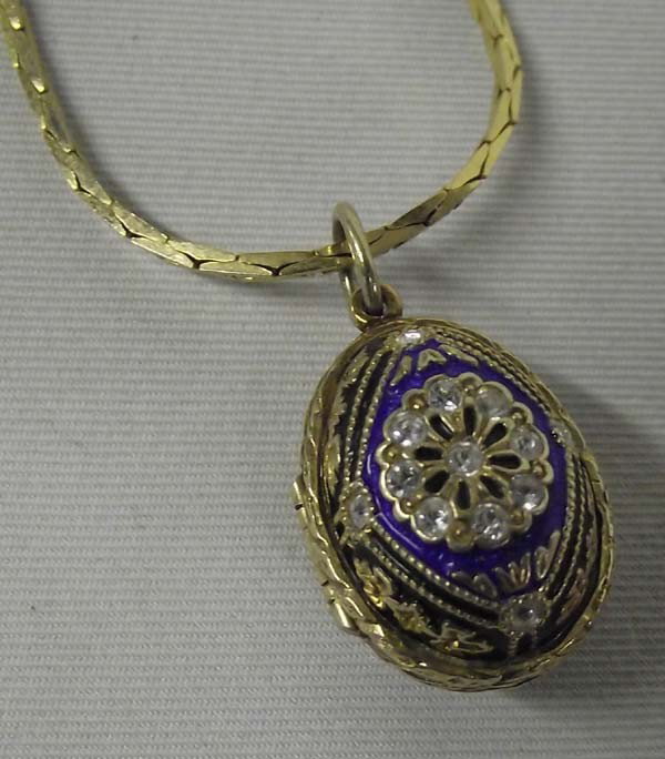 Pendant Necklace-Russian Cloisonne Egg: Pendant Necklace-Russian Cloisonne Egg. Egg opens to reveal a tiny rabbit on a chain. The necklace measures 23'', egg pendant is 1''. Buyers Pay Actual Shipping and Handling Charges(see terms and cond