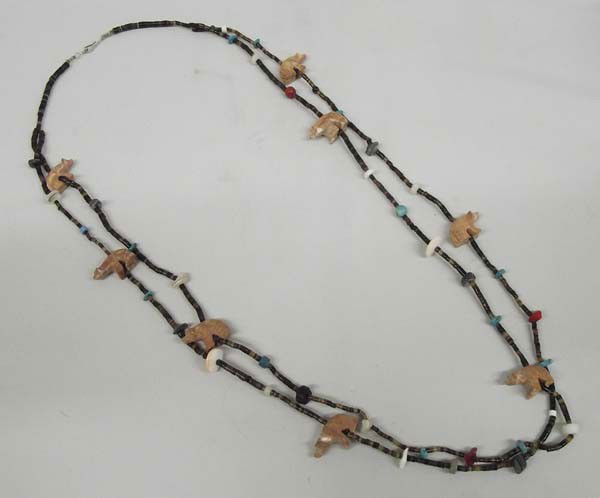 Navajo Bear Fetish Heishi Bead Necklace: PUEBLO: Navajo ETHNICITY: Native American DESCRIPTION: Lovely 2 strand Necklace with 8 stone bear fetishes. Has brown Puka Shell heishi. There are Mother of Pearl, Turquoise, Coral, Abalone, and Red S