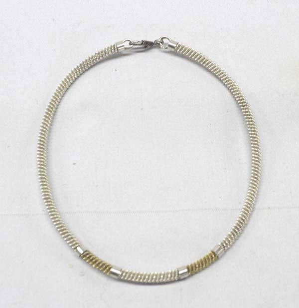 Sterling Silver Mesh Choker: DESCRIPTION: Beautiful Sterling silver mesh choker with 2 gold tone segments. SIZE: Measures approx. 15'' end to end. Buyer pays actual shipping and handling charges. (see terms and conditions for mor