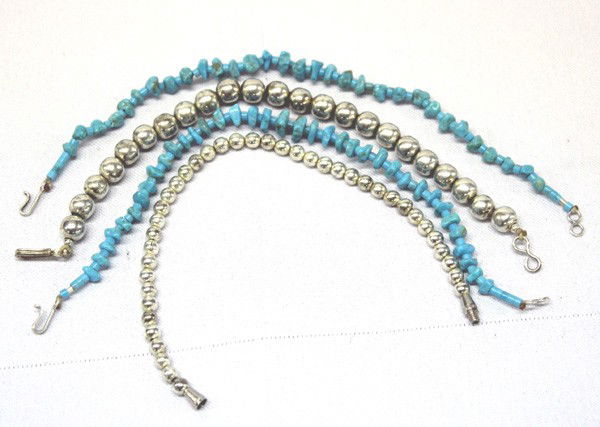4 Navajo Turquoise & Sterling Bead Bracelets: PUEBLO: Navajo ETHNICITY: Native American DESCRIPTION: Very nice turquoise nugget and heishi bead bracelets and solid sterling silver bead bracelets. One silver bracelet has a screw closure. String ti