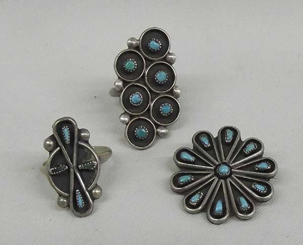 Zuni Sterling Silver Turquoise Rings & Pin: AGE: Vintage PUEBLO: Zuni ETHNICITY: Native American DESCRIPTION: Nice little lot of jewelry. 2 rings with turquoise stones, one ring has turquoise done in petit point. One pin with petit point turquo