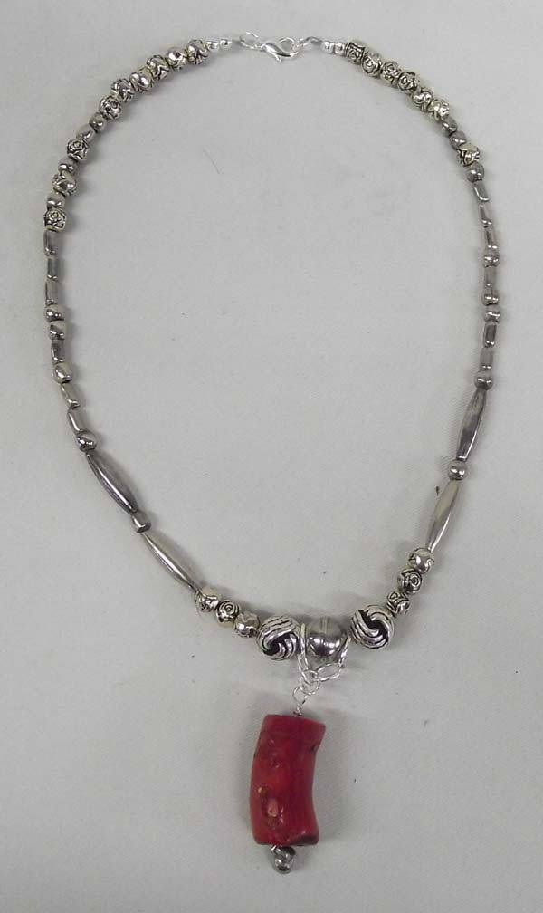 Quail Ridge Sterling Red Branch Coral Choker: DESCRIPTION: Choker of silver beads (tube beads are sterling, others are not) and a Mediterranean branch coral pendant. Quail Ridge is a local Silver City, NM artist. SIZE: Necklace measures 16'' end 