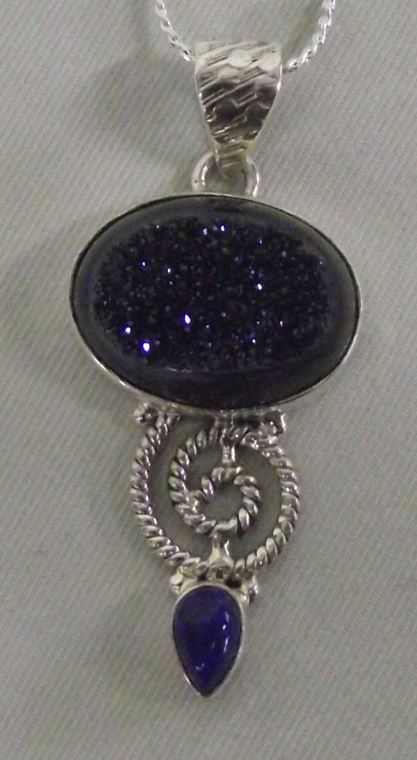 Sterling Silver Lapis Titanium Blue Druzy Necklace: DESCRIPTION: Lovely Necklace with Sterling silver chain and setting for a pendant of titanium blue druzy and lapis. SIZE: Chain measures 20'' end to end. Pendant is 2''Lx1''W.