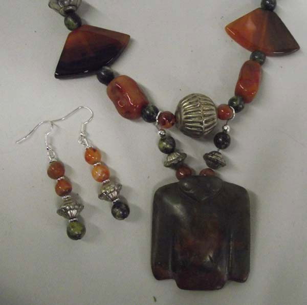 Chinese Jade Bird Pendant Necklace & Earrings: DESCRIPTION: Beautiful Carved Chinese Jade Bird Pendant Necklace with Matching earrings. Necklace has Carnelian fan beads, hollow silver plate beads with Amber nuggets and beads of Jade. Kambaba jaspe