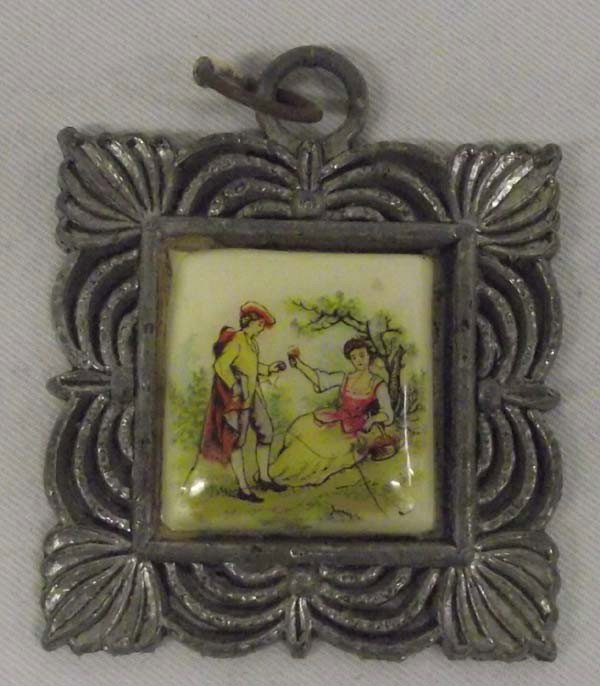 Antique Estate English Pendant: Antique Estate English Pendant. Pewter setting for a handpainted tile with Victorian scene. The setting is 1-7/8''Wx2.25''L including the bale. Tile center is 1''x1''.