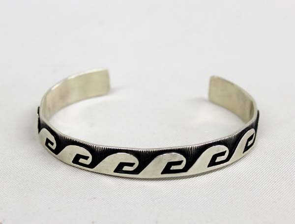 Hopi Sterling Water Wave Bracelet - MK: Native American Hopi Sterling Water Wave Bracelet - MK, top of water wave is accented with a fine rope edge, the Hopi water wave symbolically represents the continuos flow of life or rebirth as water 