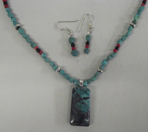 Sally Rocks Sterling Sonoran Sunset Necklace Set: Sally Rocks Sterling Sonoran Sunset Necklace Set. The necklace measures 18'' with the pendant measuring 1 1/2'' in length x 3/4'' wide. Earrings measure 1'' with fish hook findings for pierced ears. T
