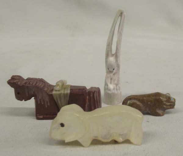 Zuni Hand Carved 4 Stone Fetishes: Native American Zuni Hand Carved 4 Stone Fetishes. A stunning carved eagle fetish with hallmark on the bottom, stands 2-1/8''H. Mother of Pearl ram fetish is 1.5''Lx1-5/8''Hx3/8''W. Also a Pipestone h