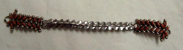 Zuni Coral Needlepoint Ladies Watchband: Native American Zuni Coral Needlepoint Ladies Watchband with stretch band. Hallmarked ''Angie''. 5'' end to end. Beautiful piece.