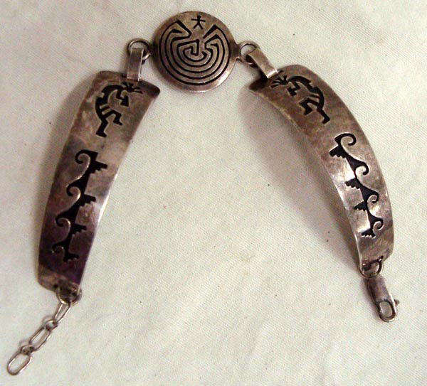 Hopi Man-in-Maze Kokopelli Overlay Bracelet - Attakai: Native American Hopi Man-in-Maze and Kokopelli Overlay Bracelet. Hallmarked ''Sterling and Attakai'' (Henry Naha--Hopi name Attakai) on the inside of the 6'' end to end bracelet. Has some age. Lobster