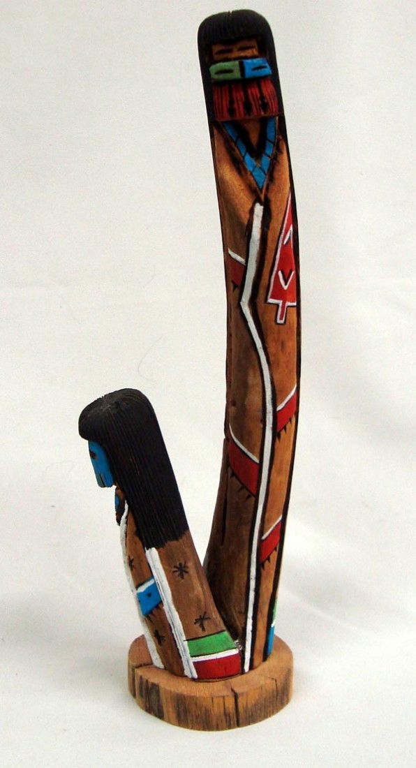 Hopi Long Hair Shalaka Kachina - James: Hopi Long Hair Shalaka Kachina - James. Carved and painted wood Kachina signed on the bottom, ''Long Haired Maiden James''. Measures 11''Hx3.5''W.