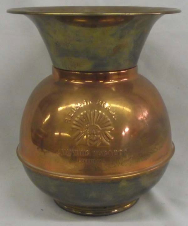 Redskin Brand Chewing Tobacco Spittoon: Redskin Brand Chewing Tobacco Spittoon. This is a brass and copper spittoon. Measures approx. 10''H x 8 1/2''Diameter.