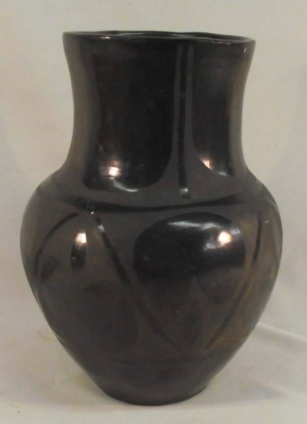 1930s San Ildefonso Pottery Jar: 1930s San Ildefonso Pottery Jar. Black on black burnished pottery. Measures approx. 8 1/2''H x 5 3/4''W.