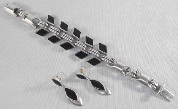 Mexican Sterling Onyx Bracelet and Earrings: Mexican Sterling Onyx Bracelet and Earrings, uniquely designed link bracelet, has 10 inlay diamond shaped onyx accents, earrings have 2 cat eye shaped onyx stones and are stamped Mexico, .925, and TS-