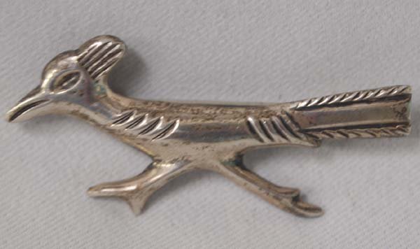 Navajo Sterling Silver Roadrunner Pin: Native American Navajo Sterling Silver Roadrunner Pin. This speedy little guy measures 2''x3/4''.