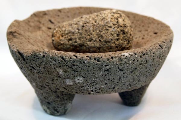 Vintage Three Legged Stone Granite Grinder: Vintage Three Legged Grinder With grinding stone. Measures approx. 3 1/2''h x 7 1/2''W. Does have some chips off edge.