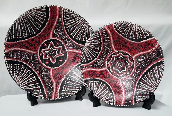 Indonesian Hand Formed and Painted Clay Bowls: Indonesian Hand Formed and Painted Clay Bowls. Shallow bowls with intricate dot Aboriginal style pattern painted on the front of each. From Lombok, Indonesia. Small one measures 11'' diameter, large o