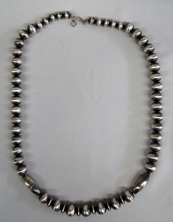 Navajo Sterling Silver Necklace - Virginia Tso: Native American Navajo Sterling Silver Necklace - Virginia Tso. Nice hollow beads, strung on wire. Measures approx. 25''. Beautiful necklace.