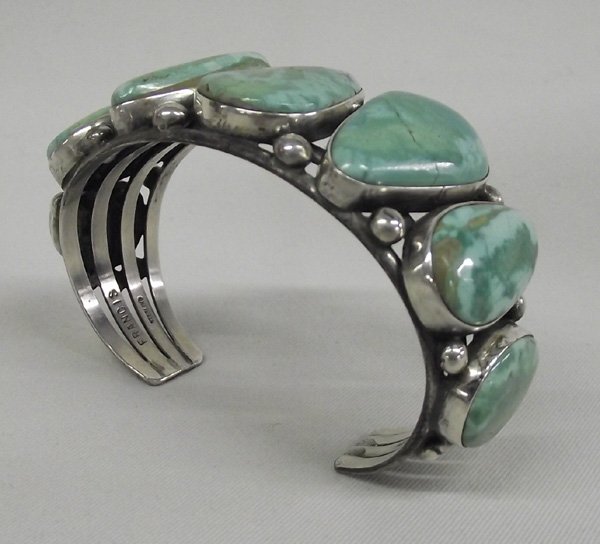 Navajo Sterling Turquoise Bracelet - Frances: Native American Navajo Sterling Silver Crow Springs Nevada Turquoise Bracelet by artist Melvin Frances. Beautiful bracelet made with rare Crow Springs Nevada turquoise. Pressure stabilized crack on on