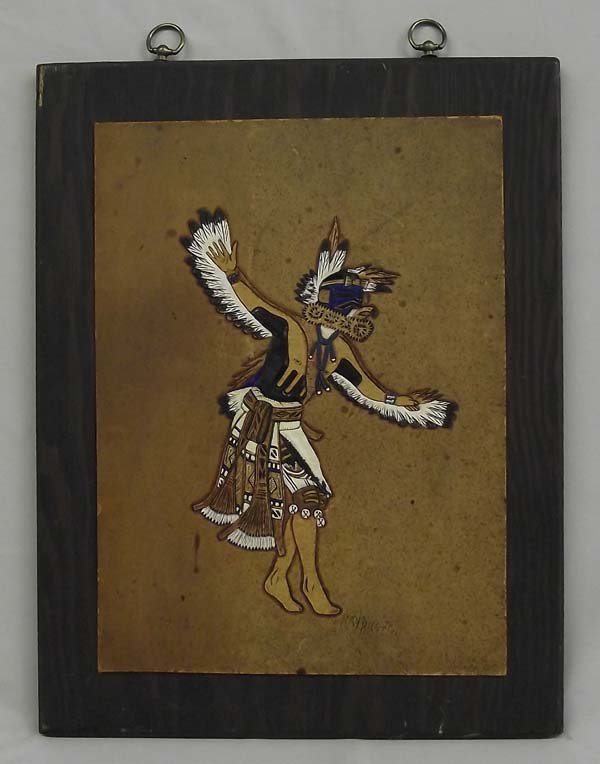 Kachina Sculpted & Painted On Leather - Ray Briggs: Kachina Sculpted & Painted On Leather - Ray Briggs. Measures approx. 15 3/4''H X 11 3/4''W. Mounted on wood with hanger on the top, some staining on the leather.