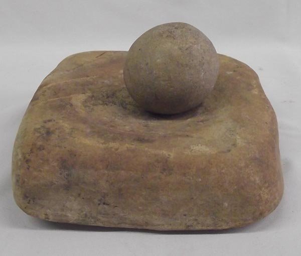 Prehistoric Stone Mano and Metate: Prehistoric Stone Mano and Metate. Rectangular shaped metate with depression in the center and a round mano. The metate measures 8''W x6''L x 1.75''H. Acquired in accordance with all State and Federal