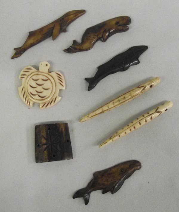 Northwest Coast Carved Animal Bone Figures: Northwest Coast Carved Animal Bone Figures. Eight small carvings that include whales, a turtle and other objects. The longest measures 2.5''Lx1''W.